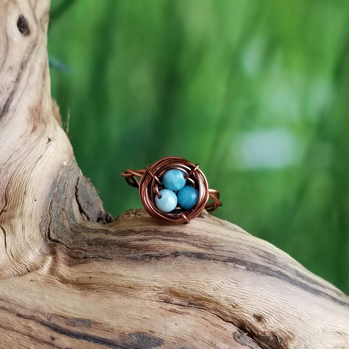 Nestling Ring with Blue Stones – Treasure of Crows